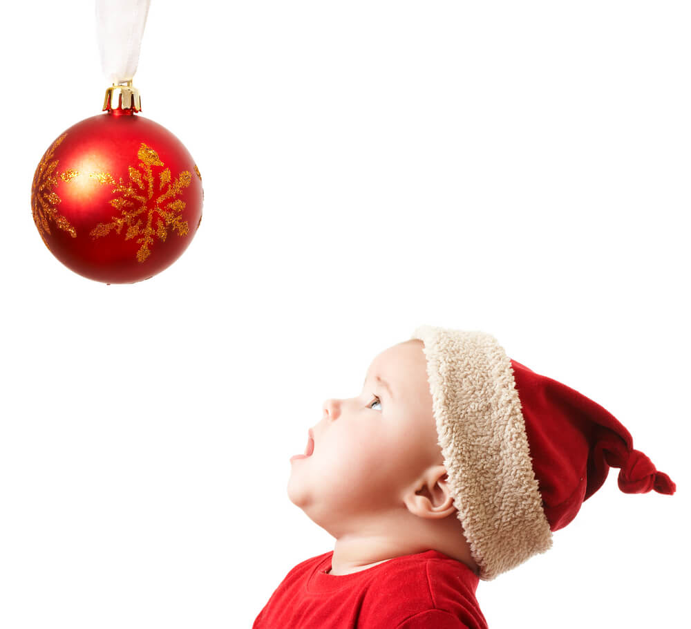 Baby With Christmas Ornament