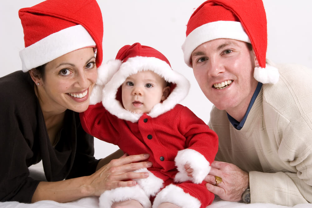 Family Dressed in Christmas Costumes